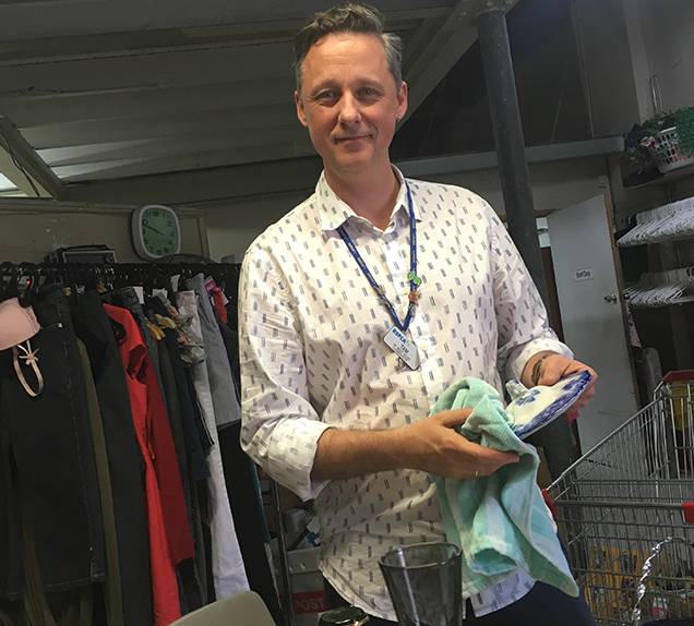 rspca op shop volunteer sorting store items